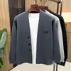 Nuevo cárdigan de punto para hombre Otoño 2026, Chaqueta suéter versátil de color liso, casual y holgada, a la moda, para hombres de mediana edad