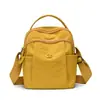 Bolsa para botella de agua de viaje al aire libre transfronteriza, bolso de mano multifuncional para el hombro, bolso cruzado, nuevo bolso para mujer 2026, tela de nailon impermeable