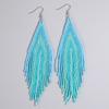 Pendientes largos originales de estilo étnico bohemio con cuentas y borlas tejidas a mano con pequeñas cuentas de arroz para mujer