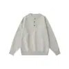 Ropa Vintage 25 Otoño/Invierno Nuevo Retro Suéter de Color Sólido con Cuello Henley de Punto Casual Versátil de Gama Alta