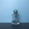 Frasco de perfume avançado de 50ML com tampa de bola redonda, frasco sub-frasco de perfume portátil, frasco de vidro com barra vertical, frasco spray cosmético