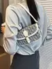 Bolso Transfronterizo para Mujer 2026 Nuevo Modelo Textura Retro Europea y Americana Estampado Bolso de Hombro Estilo Monograma de Letras de Nicho Elegante Bolso Cruzado