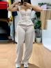 Moda Feminina Europeia e Americana para Comércio Exterior 2025 Colete Curto Estreito com Alça de Espaguete Slim Calça de Perna Larga Solta Elástica Conjunto