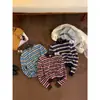 Colección de otoño MZI STUDIO: Estilo coreano, suave y femenino, a rayas de bloques de color, suéter cálido de botones suave y cómodo A80262