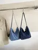 Nova bolsa de ganga transfronteiriça para o outono de 2026, elegante e leve, bolsa tote artística para mulheres, adequada para estudantes universitários levarem para a aula, bolsa de ombro