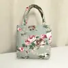 Bolsa Pequena de Lona Espessa Bolsa Pequena Portátil Feminina Bolsa Feminina Estampada Bolsa Feminina Atacado Bolsa de Tecido para Mamãe Bolsa para Celular e Moedas Feminina