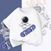 Camiseta de Manga Corta para Niños de Algodón Puro 2026 Nuevo Dibujo Animado Astronauta Ropa de Verano para Niños de Edad Media y Mayores y Niños Tops de Verano
