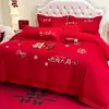 Juego de cuatro piezas de bordado de boda de algodón brillante y amigable con la piel al por mayor, juego de ropa de cama de boda estilo chino