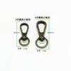 Atacado do Fabricante Fivela de Metal para Cachorro Ferragens para Bagagem Fivela de Corrente Fivela de Gancho Fivela de Pendurar para Bolsa de Chave Fivela com Placa de Fundo Redonda de 3 Pontos 4 Pontos