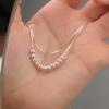 Collar Minimalista de Cadena de Hueso de Serpiente de Doble Capa con Cuentas Redondas Plateado para Mujer 2025 Nuevo Lujo Accesible Diseño Nicho Cadena de Clavícula de Alta Gama