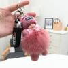 Llavero con colgante de bola de pelo de zorro y muñeco para dormir, bonito y bonito, para coche, lote de 2