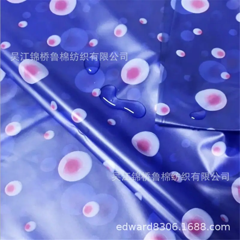 化纤牛津布印花素色雨衣膜.JPG