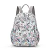 Mochila de Maternidade Estampada Nova Moda 2025 Versátil Casual Grande Capacidade Mochila de Viagem Leve de Nylon Bolsa Feminina