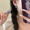 Pendientes de orquídea china para mujer, diseño de flor antigua, elegantes pendientes de cheongsam, 2025