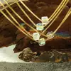 Collar de cadena para clavícula con colgante de cristal de vidrio estilo ins frío niche pequeño japonés y coreano para el trabajo cadena de titanio venta al por mayor