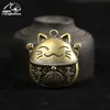 Chaveiro de latão gato da sorte carro chaveiro criativo pingente gato oco vintage pingente masculino e feminino atacado
