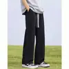 Jeans acampanados con forro de polar negro directo de fábrica para hombre, pantalones rectos holgados de moda de invierno para hombre de la alta calle americana