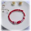 Pulsera de Cuerda Flor de Durazno Conejo Año del Conejo Hecha a Mano Original Cuerda de Mano Usando Colgante Perro Gui de Jade Cuentas de Transferencia Estilo Adorable