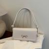 Bolsa Pequena Quadrada Estilo Coreano com Laço Casual 2025 Nova Moda Início da Primavera Design Cor Sólida Elegante Transversal de Mão