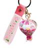 Botella de arena movediza líquida globo aerostático color lindo llavero de frijol adorno exquisito para mochila escolar niño niña colgante regalo pequeño