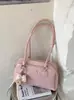 Item Quente com Relevo de Cruz Bolsa de Axila Feminina 2026 Nova Nicho Alta Aparência Bolsa de Ombro Único Versátil Toque de Luxo Bowling
