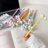 Temporada de regreso a clases flor de tela personaje de dibujos animados bolígrafo de gel para escribir, bolígrafo de girasol creativo para estudiante, bolígrafo de regalo