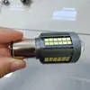 Farol dianteiro de motocicleta H4 de três pinos branco e amarelo para veículo elétrico, holofote integrado de alto e baixo feixe, lâmpada BA20D de duas cores