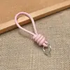 Bolsa de Corda de Couro PU Colorida Pingente Estilo Miu Simples Versátil Charme de Bolsa Chaveiro Acessório Lanyard de Celular Estilo Curto Novo