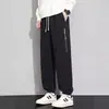 Calça Jogger da Moda para Homens, Outono 2026 Nova Calça de Moletom Cinza Estilosa e Versátil, Marca da Moda, Calça Casual Solta Plus Size
