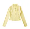 Top Deportivo de Yoga y Fitness Estilo Chica Caliente Estilo Americano Nuevo para Primavera y Otoño 2026 Chaqueta de Manga Larga con Cuello Alto y Cremallera Corta para Mujer