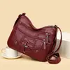 Bolso de textura suave de piel para mujer, nuevo modelo 2025, simple y elegante, bolso versátil para mamá, moderno bolso de hombro y cruzado de gran capacidad