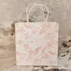Nuevo Set de Regalo Rosa Flor de Cerezo de Dos Piezas Caja de Regalo Bolsa de Regalo Loción Corporal Gel de Ducha Crema de Manos Caja de Empaque Bolsa de Papel