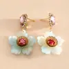 Pendientes de botón de flor de resina con incrustaciones de pedrería y aguja de plata transfronterizos europeos y americanos, pendientes de moda simples de lujo ligero, accesorios de oreja de moda para mujer