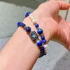 Pulseira de Múltiplos Círculos com Design de Lápis Lazúli Natural e Pérola de Água Doce