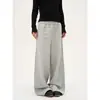 Calça de moletom larga estilo palácio retrô da moda com várias fileiras de botões, cintura elástica, corte solto e caimento fluido, adequada para homens e mulheres, perfeita para primavera e verão