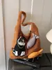 Bolso de Felpa Otoño e Invierno 2025 Nueva Moda Estilo Perezoso Artístico Bolso de Hombro para Mujer Gran Capacidad Bolso Casual para Viajes Tendencia