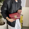 Bolso de Mano tipo Sobre para Mujer Transfronterizo Nuevo Estilo Tacto de Alta Gama Textura de Piedra Billetera para Monedas Bolso de Noche Clásico de Moda Bolso para Teléfono
