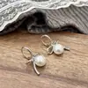 Pendientes de Perla con Lazo Dulces y Frescos, Pendientes Estilo Ballet, Pendientes de Nicho de Alta Gama, Joyería Delicada