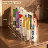 Estante de almacenamiento de ungüentos con múltiples compartimentos, organizador de tubos transparente con forma de pez para escritorio, organizador de ungüentos dividido para salón de belleza, en stock