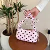 Bolso de lona con diseño único de lunares para mujer, nueva colección de verano 2026, bolso tipo cubo casual moderno y popular
