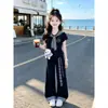 Conjunto de Verano de Dibujos Animados 2026 Dulce Lindo Gato KT Camiseta de Manga Corta Informal Pantalones de Pierna Ancha con Parches a Cuadros Conjunto de Dos Piezas