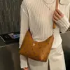 Estampado Dulce 2026 Cadena Bajo el Brazo de Moda Textura de Bolita Nuevo Bolso de Viaje para Mujer Bolso Cruzado de Moda Dibujo Animado