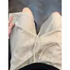 Pantalones cortos inclinados estilo "old money" transfronterizos para hombre, nuevo diseño de nicho de verano, cintura elástica, pantalones cortos casuales de playa