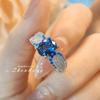 Nuevo anillo de cristal puntiagudo azul degradado de circón azul Londres con forma de huevo de ganso, diseño de nicho de temperamento, sencillo retro para mujer que combina con todo