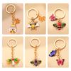 Llavero de aleación con forma de mariposa y abeja, accesorio colgante para bolso de mujer, ideal como regalo de vacaciones para niñas.