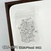 Decorações de arte para unhas com tema oceânico: Designs de estrelas-do-mar douradas e prateadas, conchas e coqueiros em estilo japonês, com apliques metálicos para unhas
