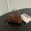 Bolso de mano estilo retro, forma de almohada, modelo para mujer, nueva colección de otoño 2026, material de gamuza, diseño de nicho, ligero, lujoso y elegante, bolso de hombro/bolso cruzado