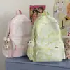 Mochila nueva estilo japonés con color degradado para estudiantes de secundaria femeninas, simple y elegante, gran capacidad, adecuada para estudiantes de preparatoria y universidad