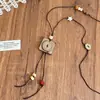 Nuevo Collar de Perlas en Forma de Media Luna Estilo Chino para Mujer 2025 Nueva Cadena Larga Popular para Suéter con Diseño Único Accesorio para el Cuello