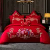 Bordado de algodón de alta gama 140 rojo boda juego de cuatro piezas dote dragón y fénix categoría de cama de algodón al por mayor